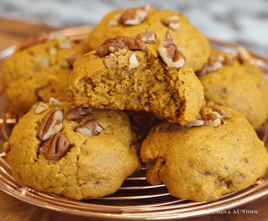 Delicious homemade Pumpkin Pecan Cookies topped with chopped pecans, perfect for fall treats and holiday baking.