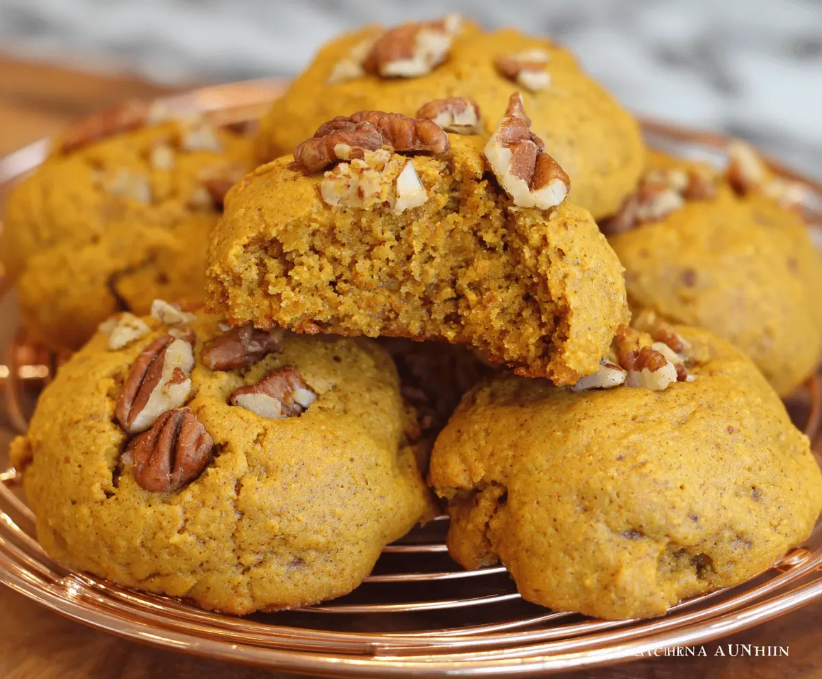 Delicious homemade Pumpkin Pecan Cookies topped with chopped pecans, perfect for fall treats and holiday baking.